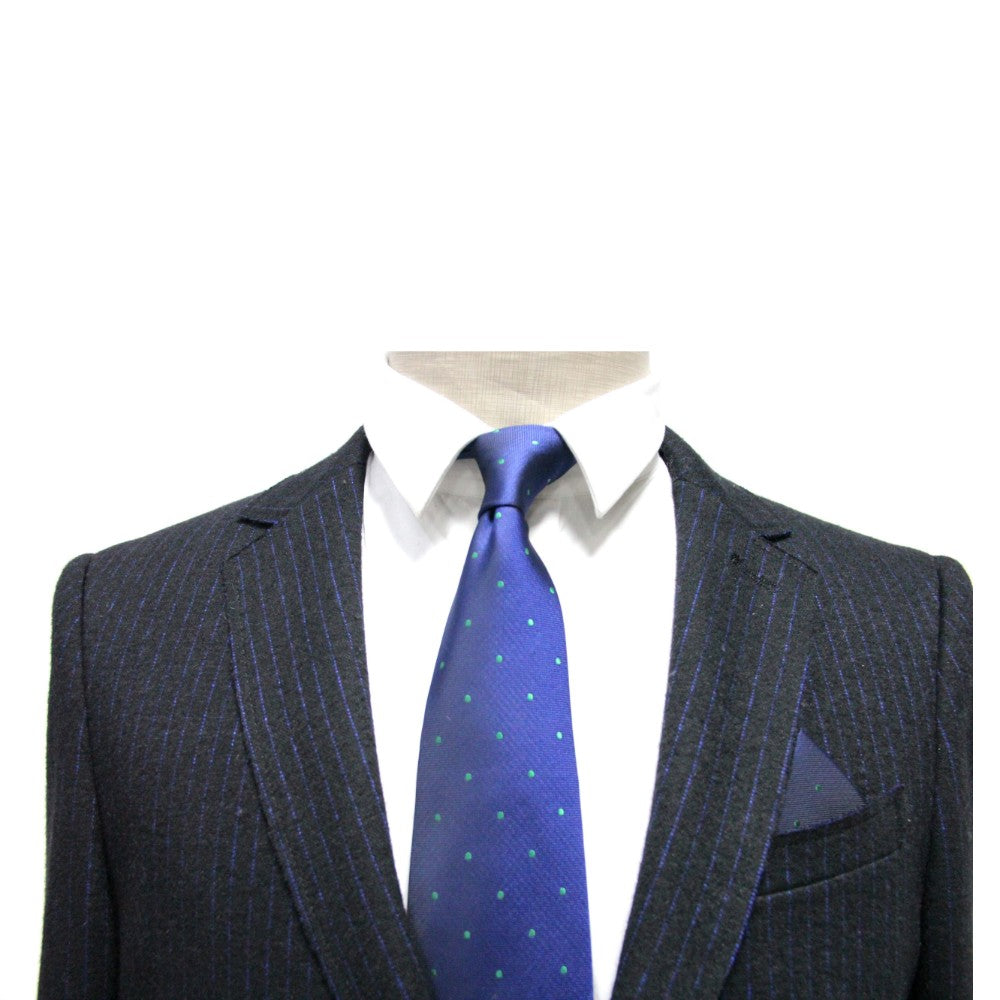 A mannequin dons a navy pinstripe suit paired with a white shirt and the Navy Green Polka Dot Business Tie & Pocket Square Set, set against a white backdrop.
