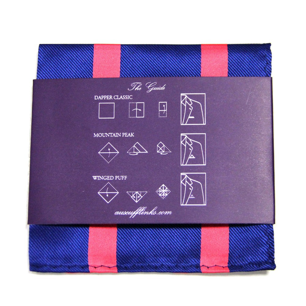 Enhance your style with our Navy Reddish Pink Stripe Business Tie & Pocket Square Set. The pocket square, featuring a blue and red stripe pattern, is part of the Modern Gentleman Accessories collection and includes instructions for "Dapper Classic," "Mountain Peak," and "Winged Puff.