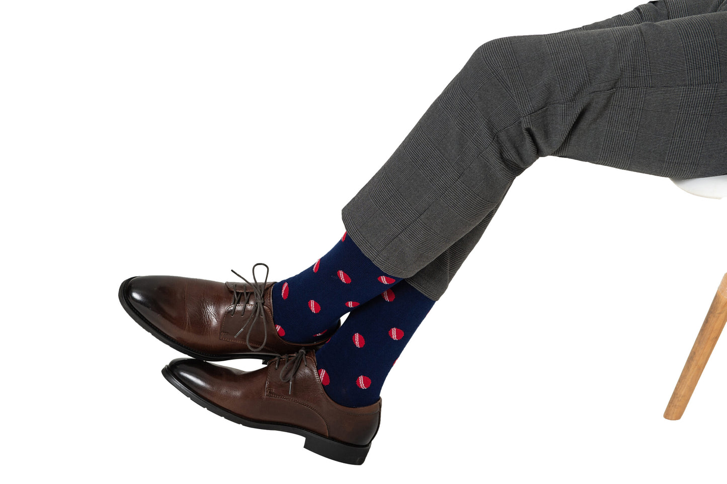 A pair of legs wearing Cricket Socks.