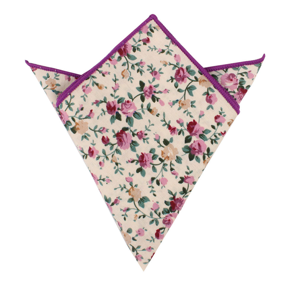 A pocket square with a floral pattern, predominantly featuring pink and yellow roses in full bloom, and purple edges from the Pastel Pink Rose Floral Cotton Skinny Tie and Pocket Square Set.