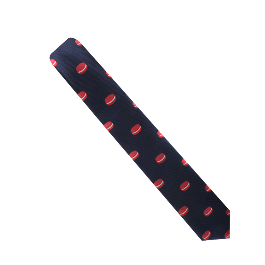 Dark blue Macaron Skinny Tie with a whimsical red and white baseball pattern, ideal for dessert aficionados who enjoy a playful yet sophisticated look.