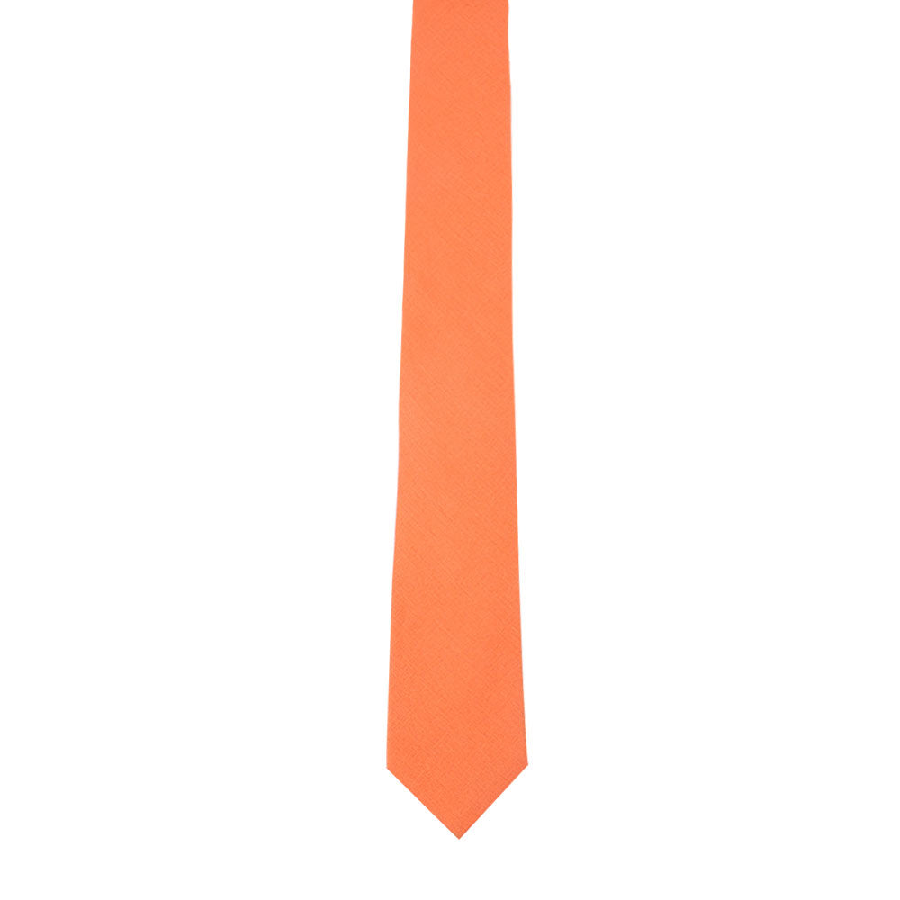 The Peach Orange Cotton Skinny Tie & Pocket Square Set showcases sleek sophistication with its vibrant hues of orange contrasted against a pristine white background.