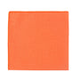 The Peach Orange Pocket Square, a pastel orange fabric, serves as both a chic napkin and pocket square. It features a plain texture with visible hemmed edges, perfect for weddings or elegant occasions.