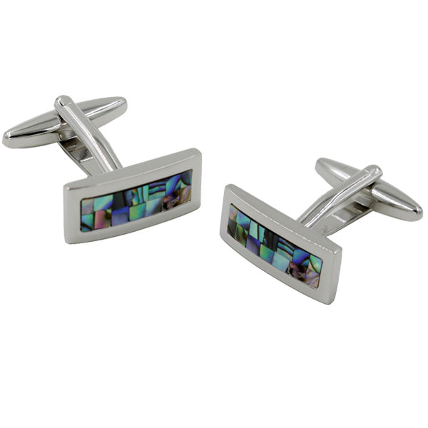 A pair of Mother of Pearl Stone Cufflinks, featuring rectangular faces displaying iridescent green, blue, and purple hues that evoke the depths of the ocean.