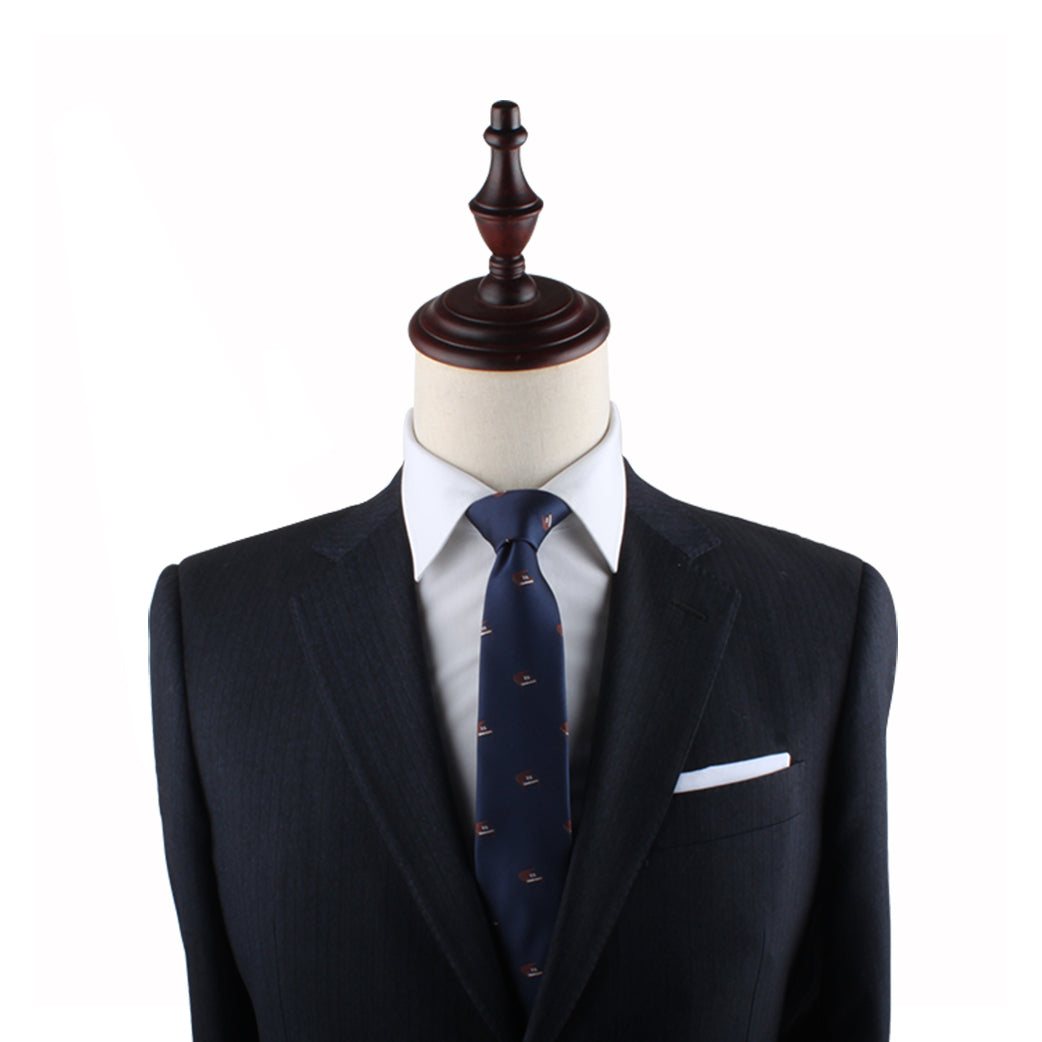 A fashionably dressed mannequin dummy donning a suit and tie with melodic finesse, the Piano Teacher Gift.