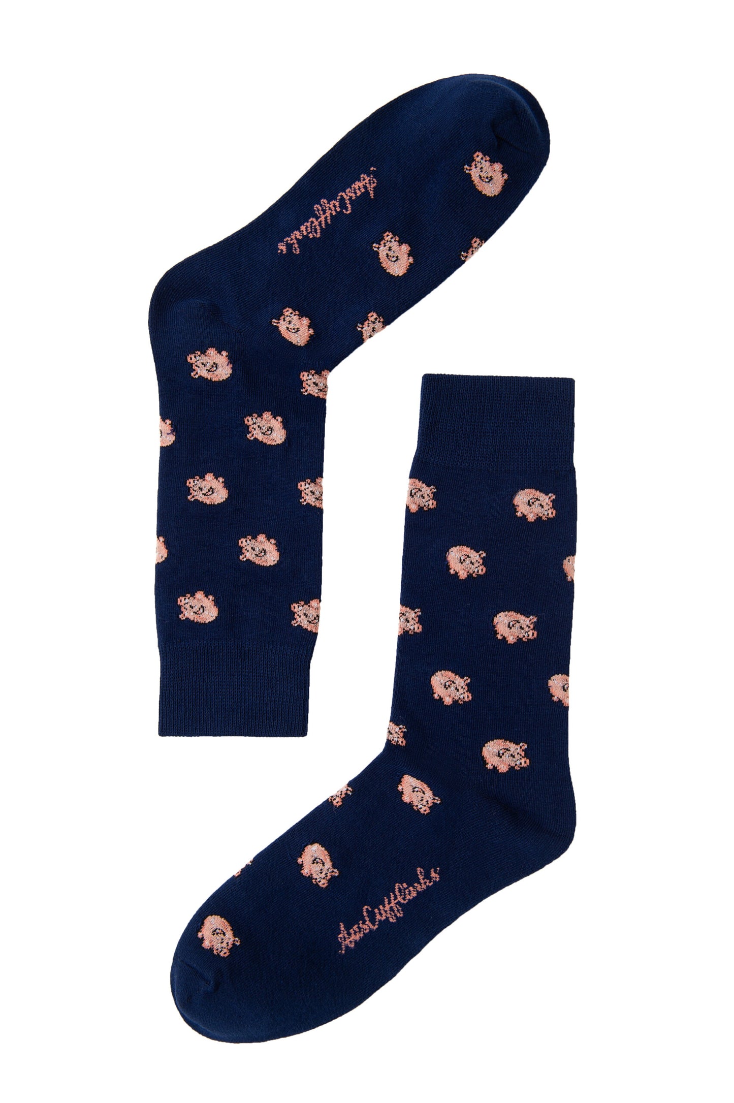 Piggy Bank Socks showcase a delightful combination of playful pink cartoon dog patterns and pink text on a navy blue background, making them both a fashion statement and the epitome of comfort.