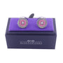 The Pink Button Cufflinks boast refined elegance with their pink and silver textured edge design, exuding timeless sophistication as they rest in a purple "AUSCUFFLINKS" box.