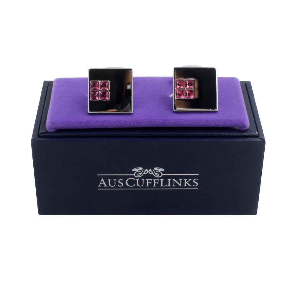 The Pink Diamonte Cufflinks, featuring premium craftsmanship, are elegantly displayed on a purple cushion atop a black box labeled "AusCufflinks.