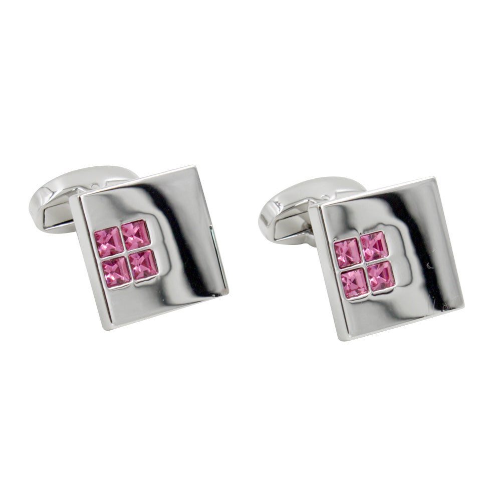The Pink Diamonte Cufflinks feature four pink gemstones arranged in a square on silver, representing premium craftsmanship. They're perfect for luxury fashion enthusiasts and add elegance to any outfit.