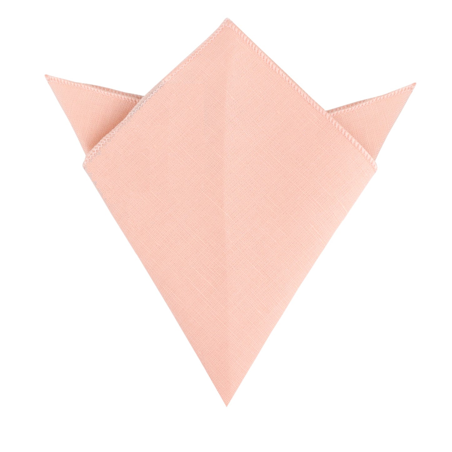 A folded Baby Pink Skinny Necktie and Pocket Square Set with pointed edges, resembling a triangular shape, is displayed against a white background, exuding pastel sophistication.