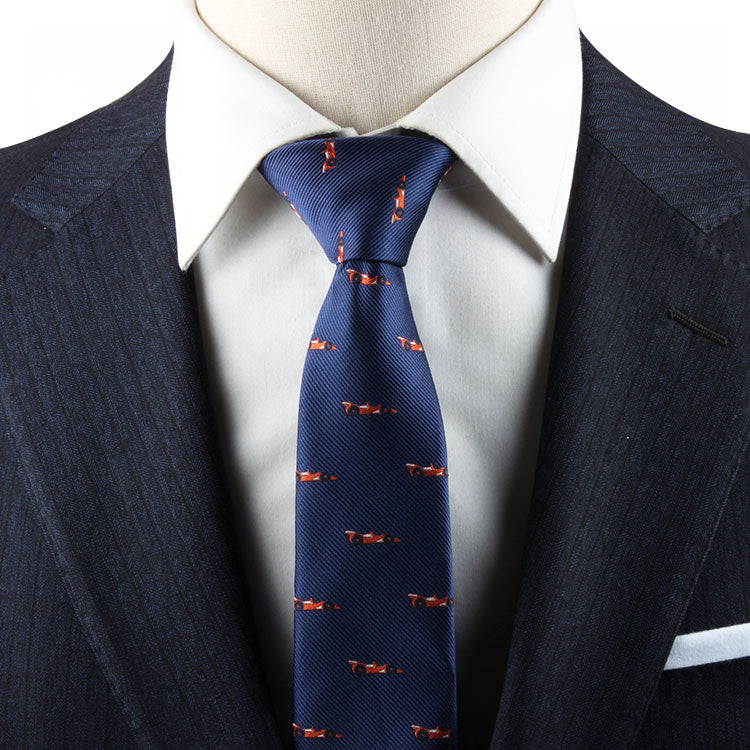 A mannequin displaying perfect harmony in its Racing Car Necktie Tie suit attire.