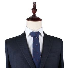 A mannequin dressed in a navy blue suit with a Red Parrot Slim Tie.