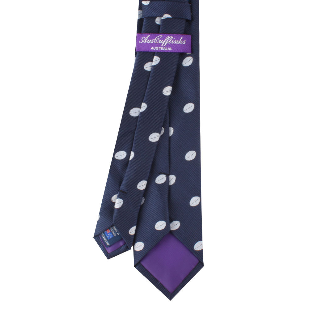 A Rugby Themed Fashion with white polka dots, featuring a purple tail and a label reading "justcufflinks australia," exudes rugged athleticism.