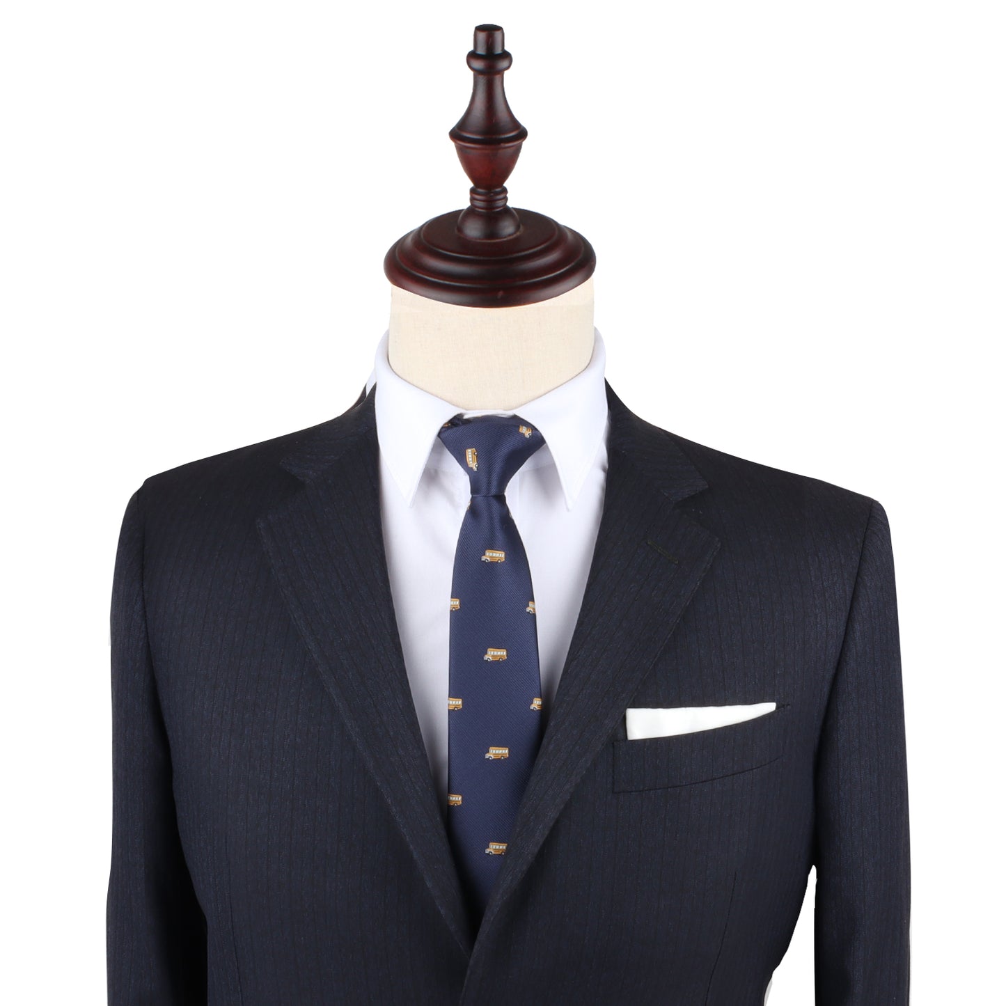 A charming mannequin donning a suit with a School Bus Slim Tie.