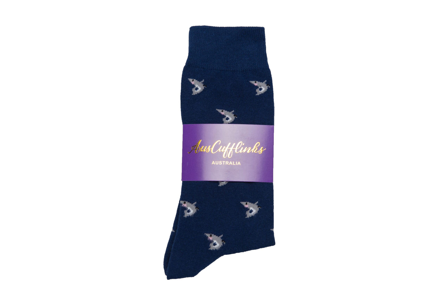 A pair of deep-sea navy blue Shark Socks adorned with a small bird pattern is elegantly packaged in a purple sleeve labeled "AustCufflinks Australia," exuding refined style.