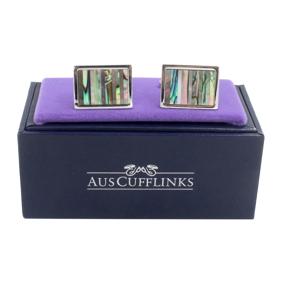 Rectangular Shell Stone Cufflinks with vibrant abalone inlay come elegantly presented in a purple velvet-lined black box featuring the "AUSCUFFLINKS" logo.