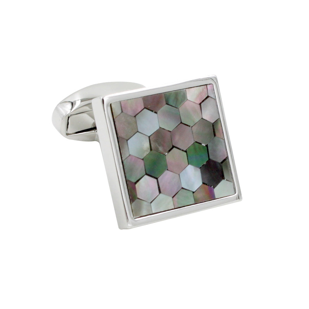 Signature Malachite cufflink with a geometric mother-of-pearl inlay and stellar design.
