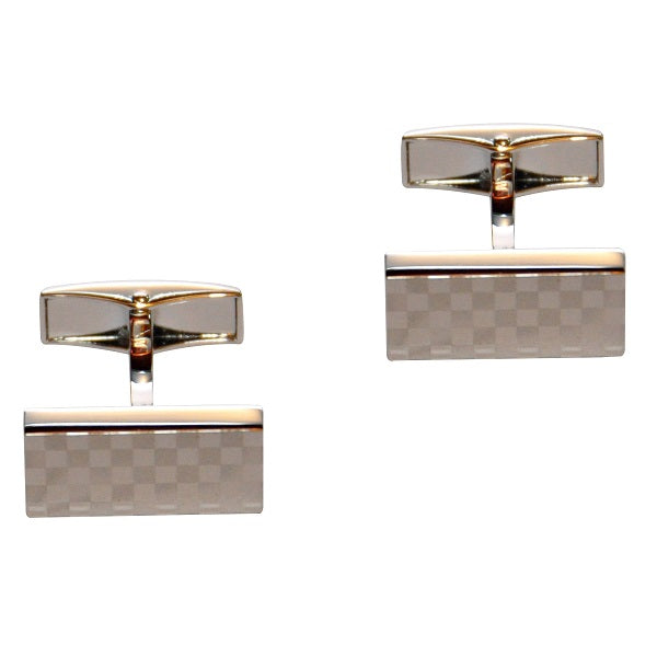The Silver Checkered Cufflinks, featuring gold accents and set against a white background, offer a sophisticated touch to any formal outfit.