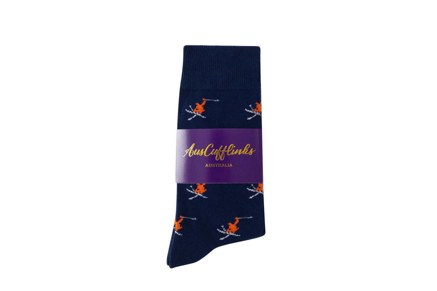 A pair of navy blue Ski Socks featuring an orange skier print, wrapped in a purple "AustCufflinks Australia" label, is displayed on a white background.