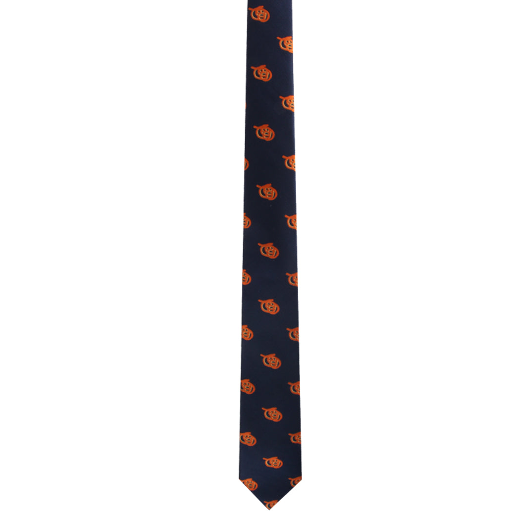 The Snack Themed Tie in navy blue features a charismatic twist with its repeated pattern of orange pumpkin faces.