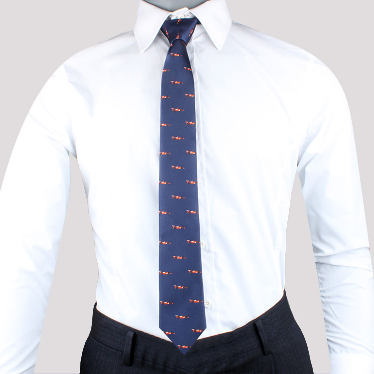 A mannequin exuding sophistication, donning a Speed Lover Tie and white shirt.
