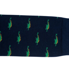Dark blue Stegosaurus sock with whimsical green and orange caterpillar pattern.