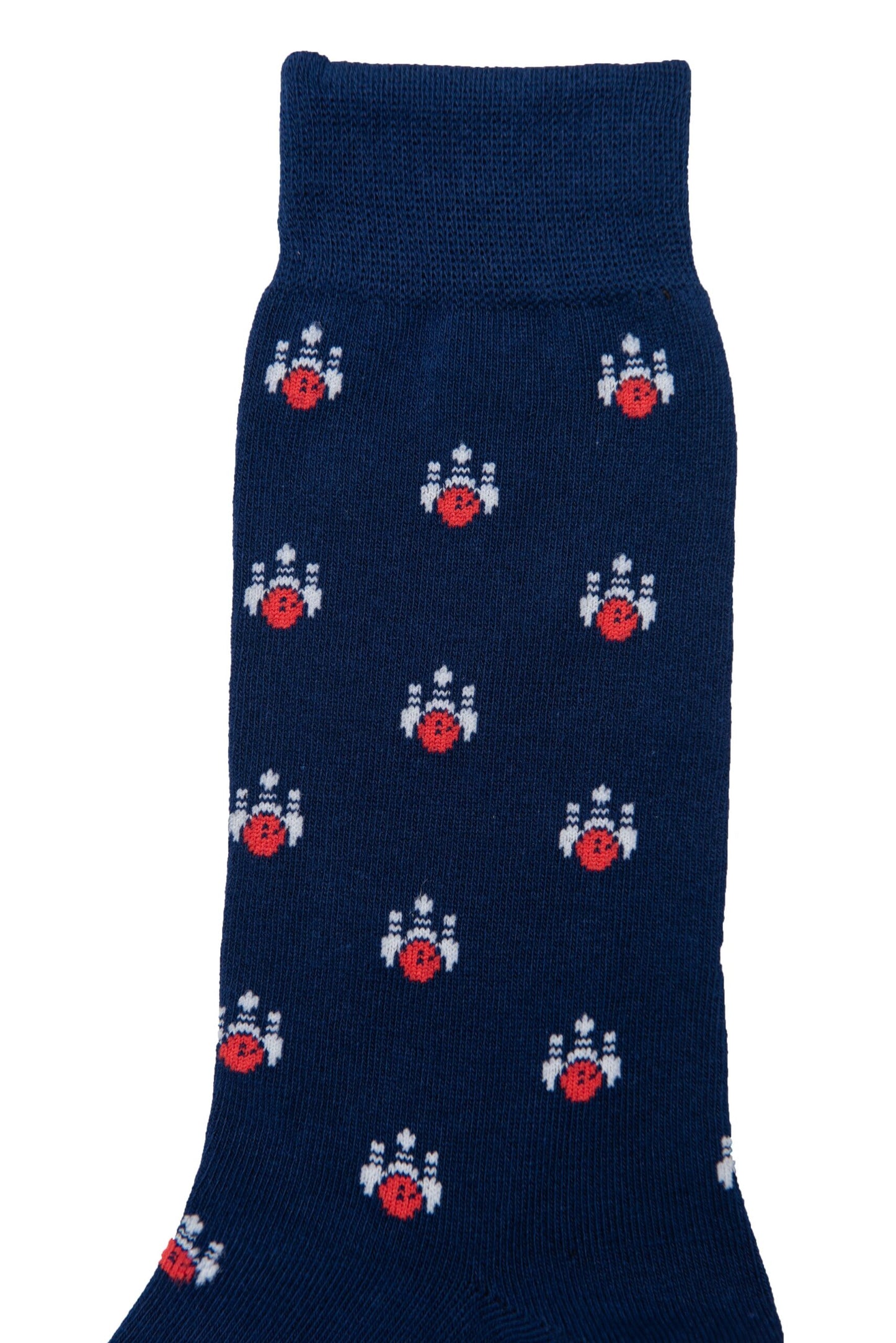 The Ten Pin Socks are a navy blue pair featuring a bold pattern of small red and white rockets.