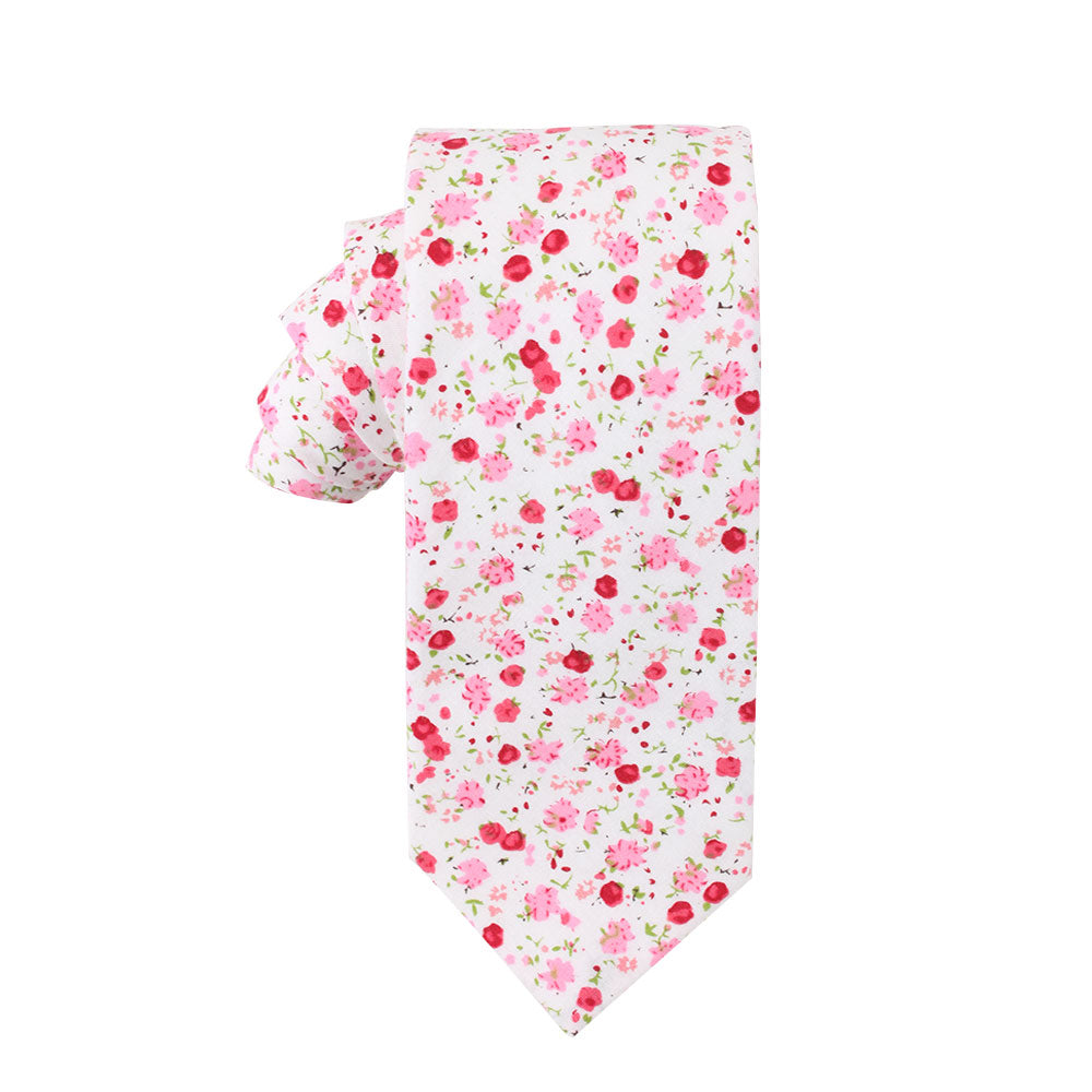 A Tonal Pink Azalea Floral Skinny Cotton Tie with blush and red flowers on a white background, exuding a subtle, dapper charm.