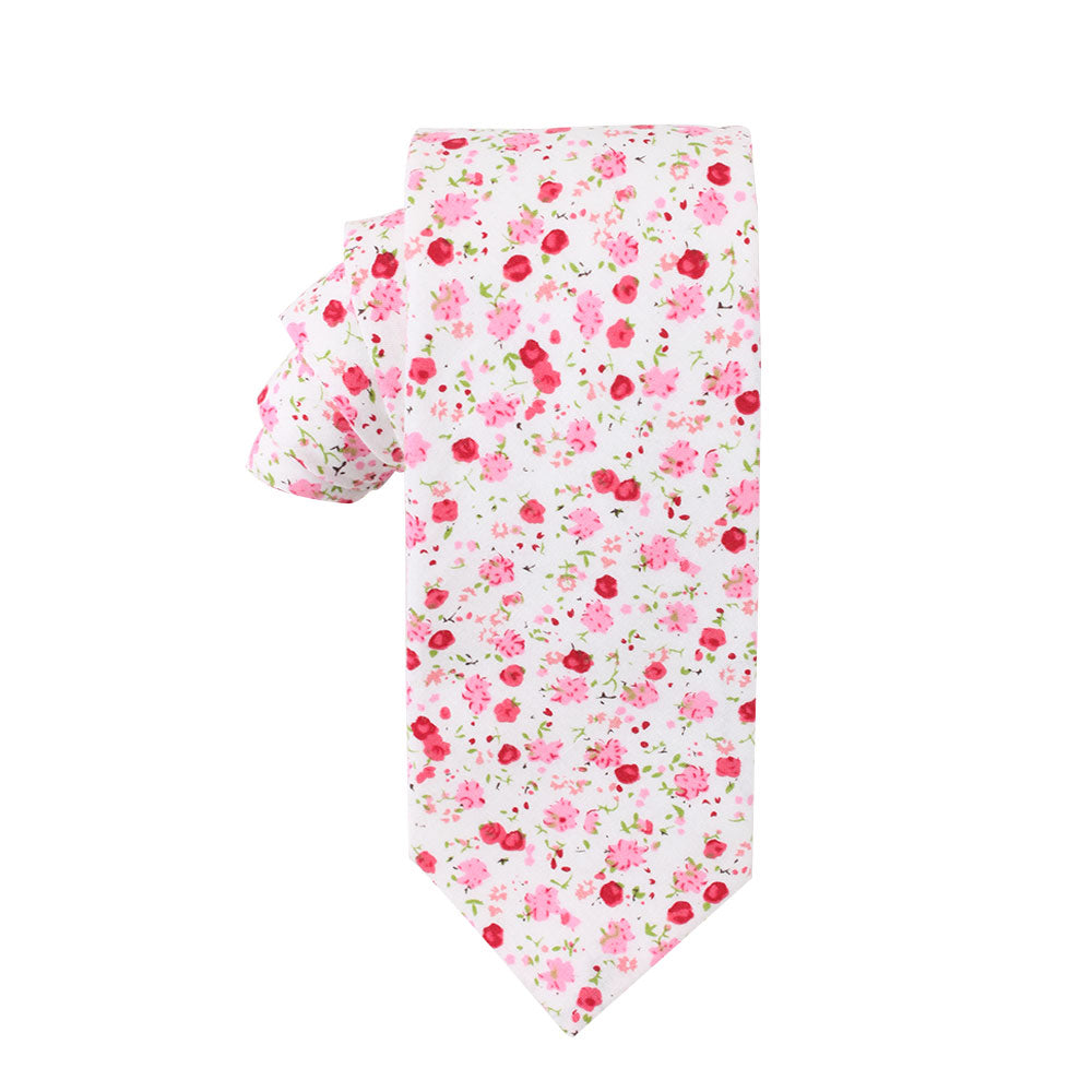 A white necktie adorned with a stunning pattern of pink and red flowers, showcasing small roses and azalea blooms woven elegantly with green leaves, is featured in the Tonal Pink Azalea Floral Cotton Skinny Tie & Pocket Square Set.