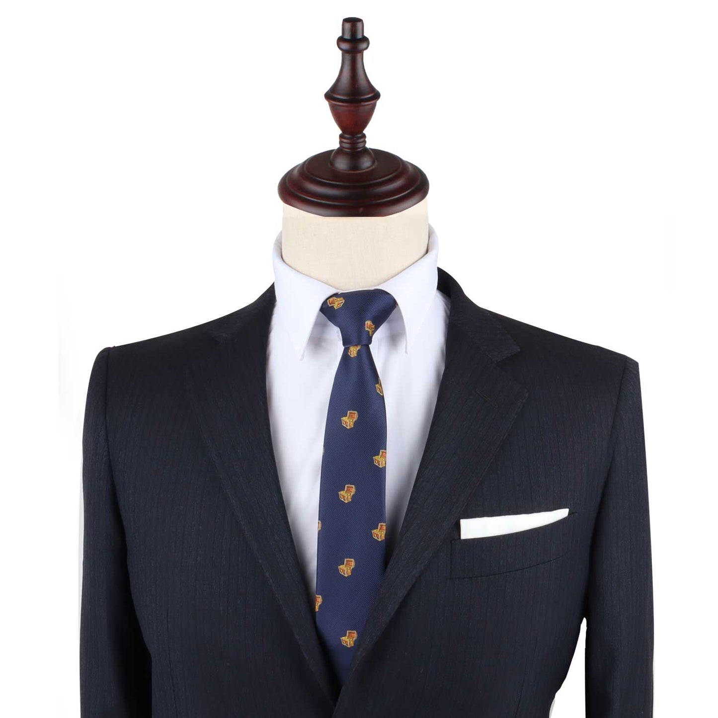 Navy blue suit with Treasure Chest Slim Tie and white pocket square displayed on a headless mannequin, designed as attire for any uncover adventure.