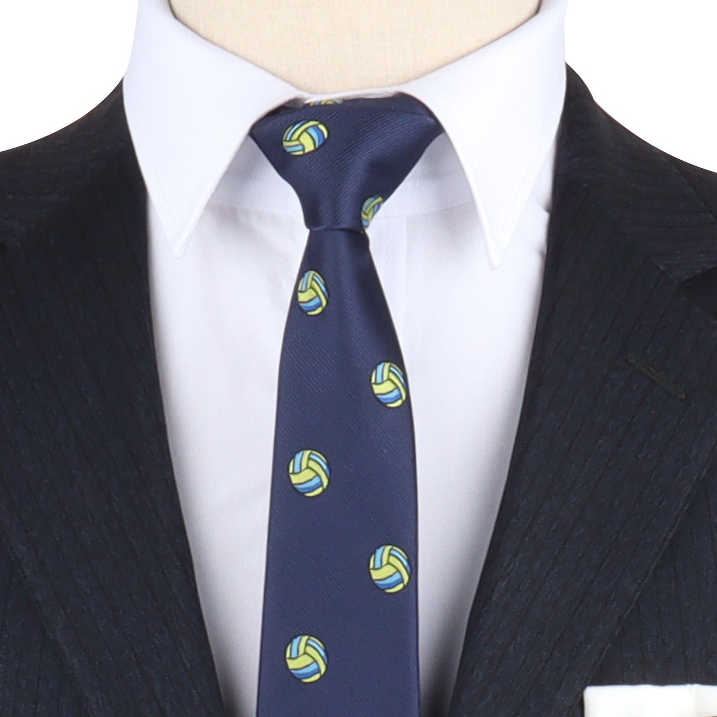 A man in a pinstripe suit wearing a white shirt and the Volleyball Print Necktie, designed with navy and adorned with yellow and green volleyball patterns, adding sporty finesse to elevate your style.