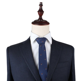 A mannequin with a distinctive style wearing a Billy Goat Skinny Tie.