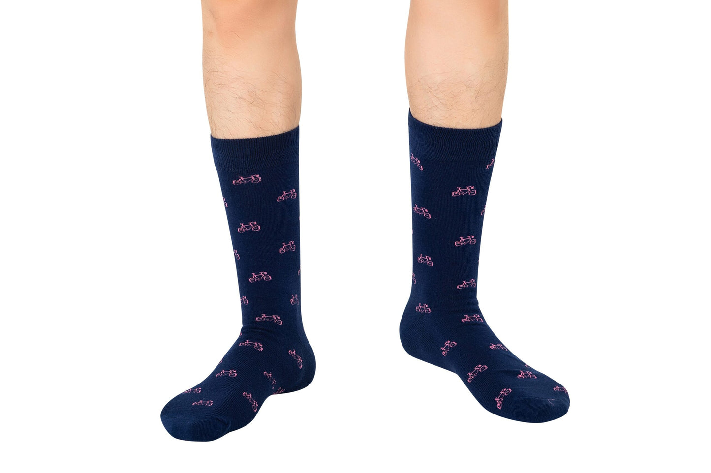 Wearing Pink Bike Socks, showcasing navy knee-high style decorated with small pink bicycle patterns, delivering rosy comfort with every step.