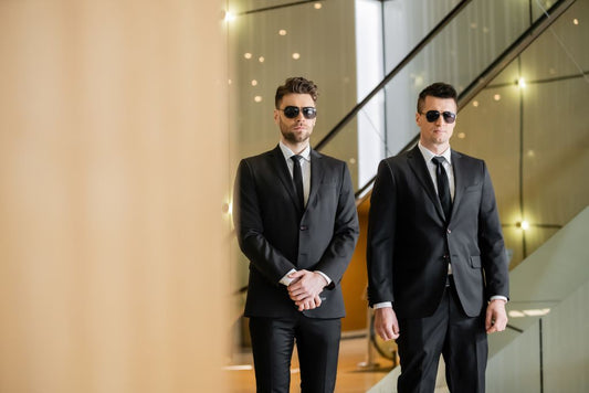 Two men in a black suit