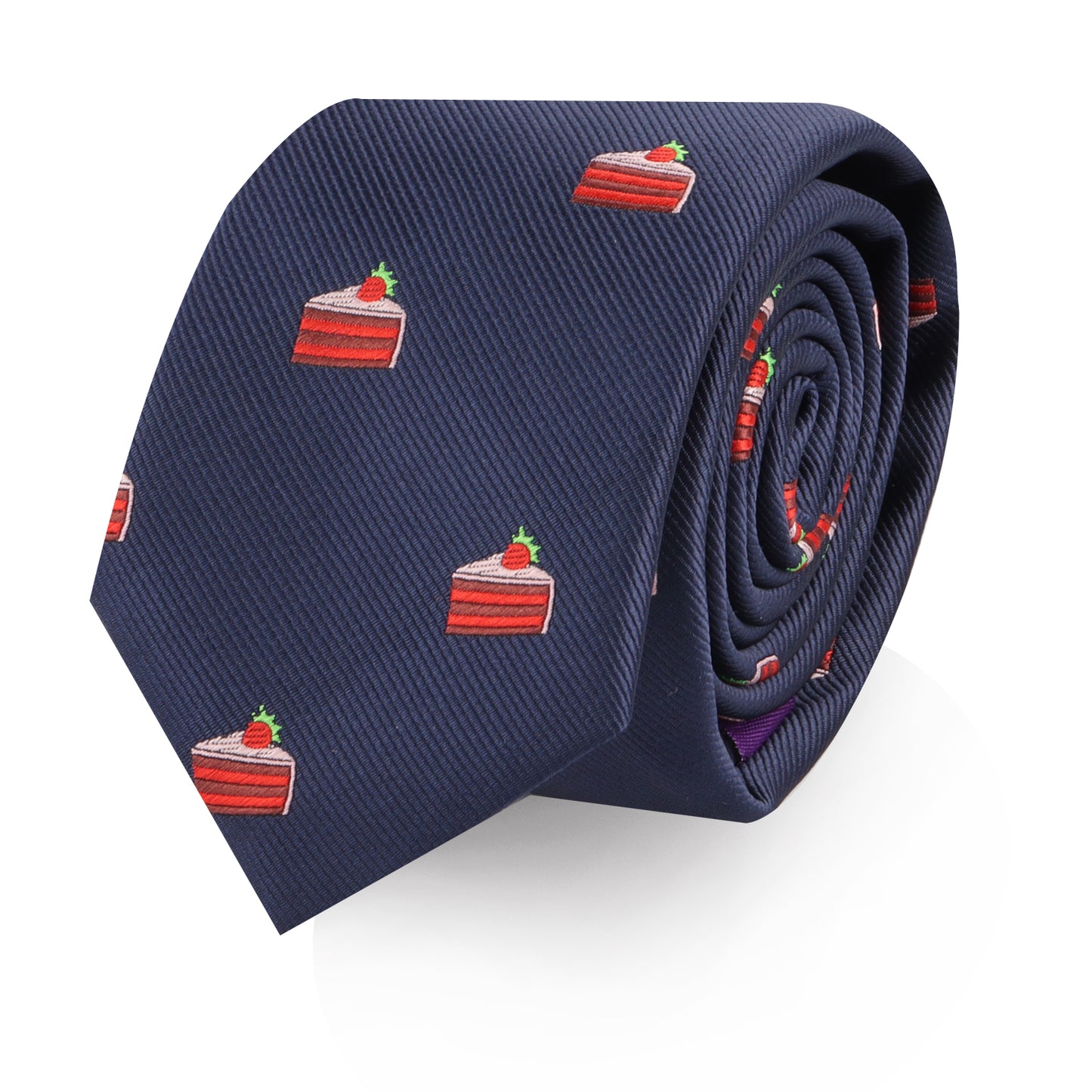 The Strawberry Cake Skinny Tie is a navy blue novelty tie featuring a repeating pattern of red and white cake slices topped with strawberries—ideal for dessert lovers.