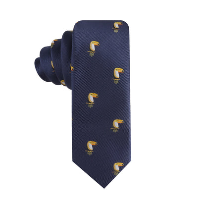 The Toucan Bird Skinny Tie is a navy blue tie with a repeating pattern of small yellow toucans—an ideal tropical bird accessory and perfect gift for bird lovers.