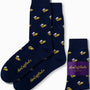 The Bee Socks, in navy blue with a yellow bee pattern, provide honeyed comfort for your day and feature a purple label that reads "AusCufflinks Australia.