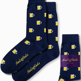 Beer Socks in navy blue showcase a fun pattern of yellow beer mugs, providing bubbly comfort with each step. Featuring a unique purple AusCufflinks label, they invite you to experience a perfect mix of style and warmth.