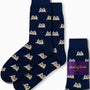 Navy "Book Socks" adorned with an open book pattern, ideal for bibliophiles, come packaged with a label that reads "AusCufflinks Australia." Experience literary luxury with every step.