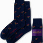 Navy blue socks with striking red cardinal bird patterns, packaged and branded as "AusCufflinks," these embody a touch of elegance perfect for any playful yet sophisticated wardrobe.