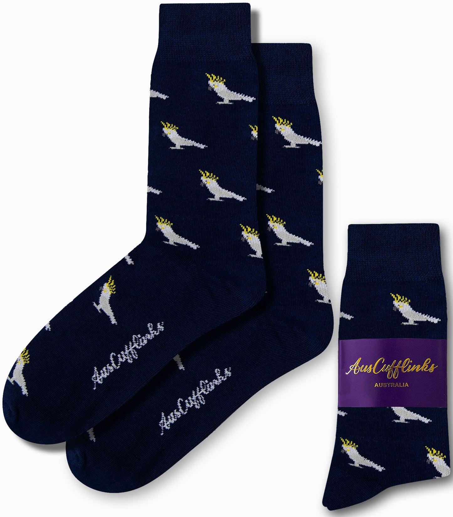 Cockatoo Socks in navy blue, showcasing a chic white cockatoo design, and complemented by matching packaging with a purple label.