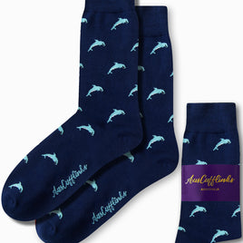 Navy blue Dolphin Socks adorned with light blue dolphin patterns, showcasing aquatic elegance and featuring the "AusCufflinks" branding on the side, accompanied by their original packaging.