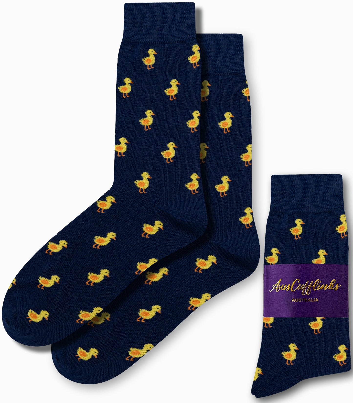 The Duck Socks, featuring a navy blue background with a lively yellow duck design, add standout style to your outfit. These delightful socks come packaged with "AusCufflinks Australia" branding, ensuring you waddle through the day with flair and confidence.