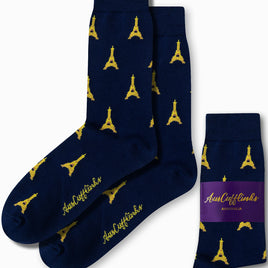 The Eiffel Tower Socks showcase a vibrant blend of navy blue with yellow Eiffel Tower designs, all wrapped up in matching packaging branded as "AusCufflinks Australia," reflecting true Parisian flair.