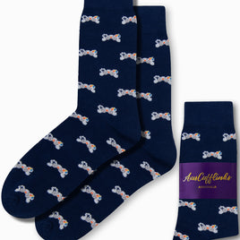 Navy blue Gamer Socks featuring a stylish repeating pattern of small, colorful dogs, all neatly presented in purple packaging labeled "AusCufflinks Australia.