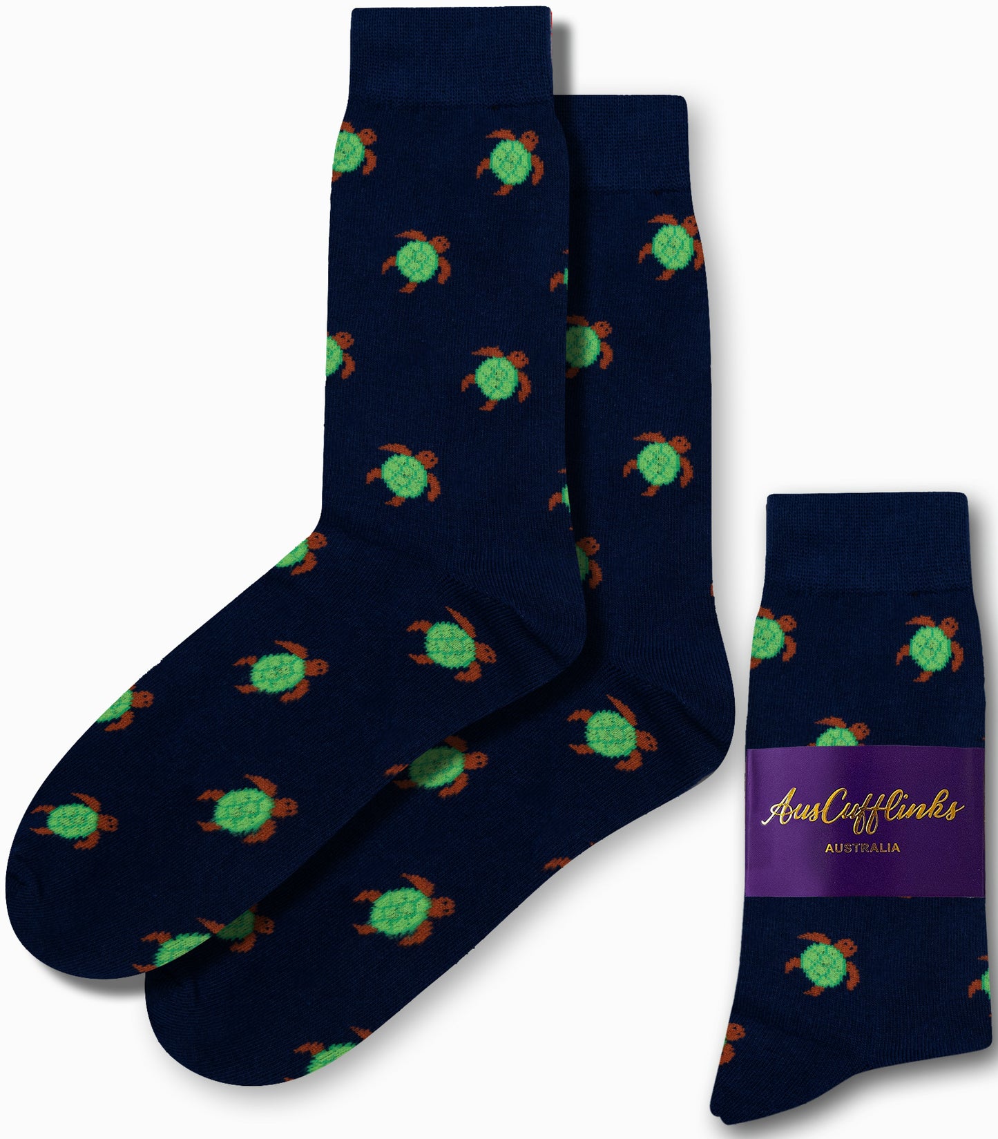 Green Turtle Socks in dark blue, embellished with an elegant pattern of green turtles. Displayed with one pair folded and labeled "AusCufflinks Australia.