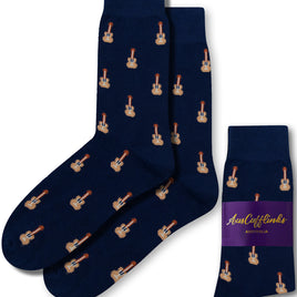 Introducing our Guitar Socks: stylish blue socks featuring a pattern of small guitars, designed for comfort in every step. They are showcased against a white background with a label that reads "AusCufflinks Australia.