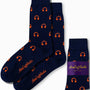 Introducing the Headphones Socks: navy blue socks adorned with an orange headphone pattern that blend style and comfort effortlessly. Showcasing the "AUS Cufflinks Australia" branding on both the side and packaging, these socks strike a perfect chord in your wardrobe ensemble.