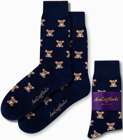 Koala Socks in navy blue featuring a delightful pattern of small koalas, complete with a branding tag that reads "AusCufflinks Australia.