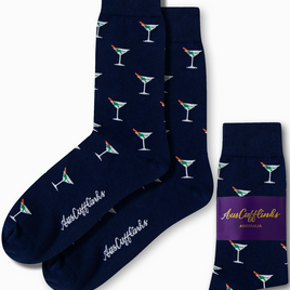 Enhance your sock collection with the Martini Margarita Socks in a deep blue hue, featuring playful martini glass designs. A purple band showcasing "AusCufflinks Australia" adds a splash of vibrant style to your outfit.